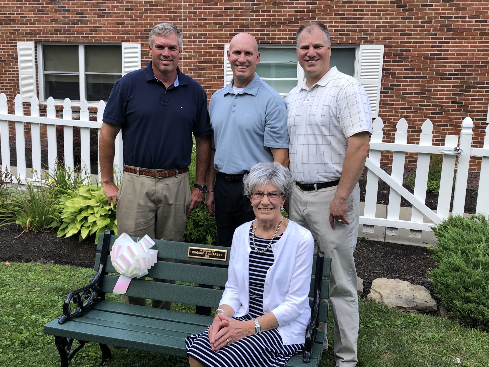 Bench dedication with widow and sons